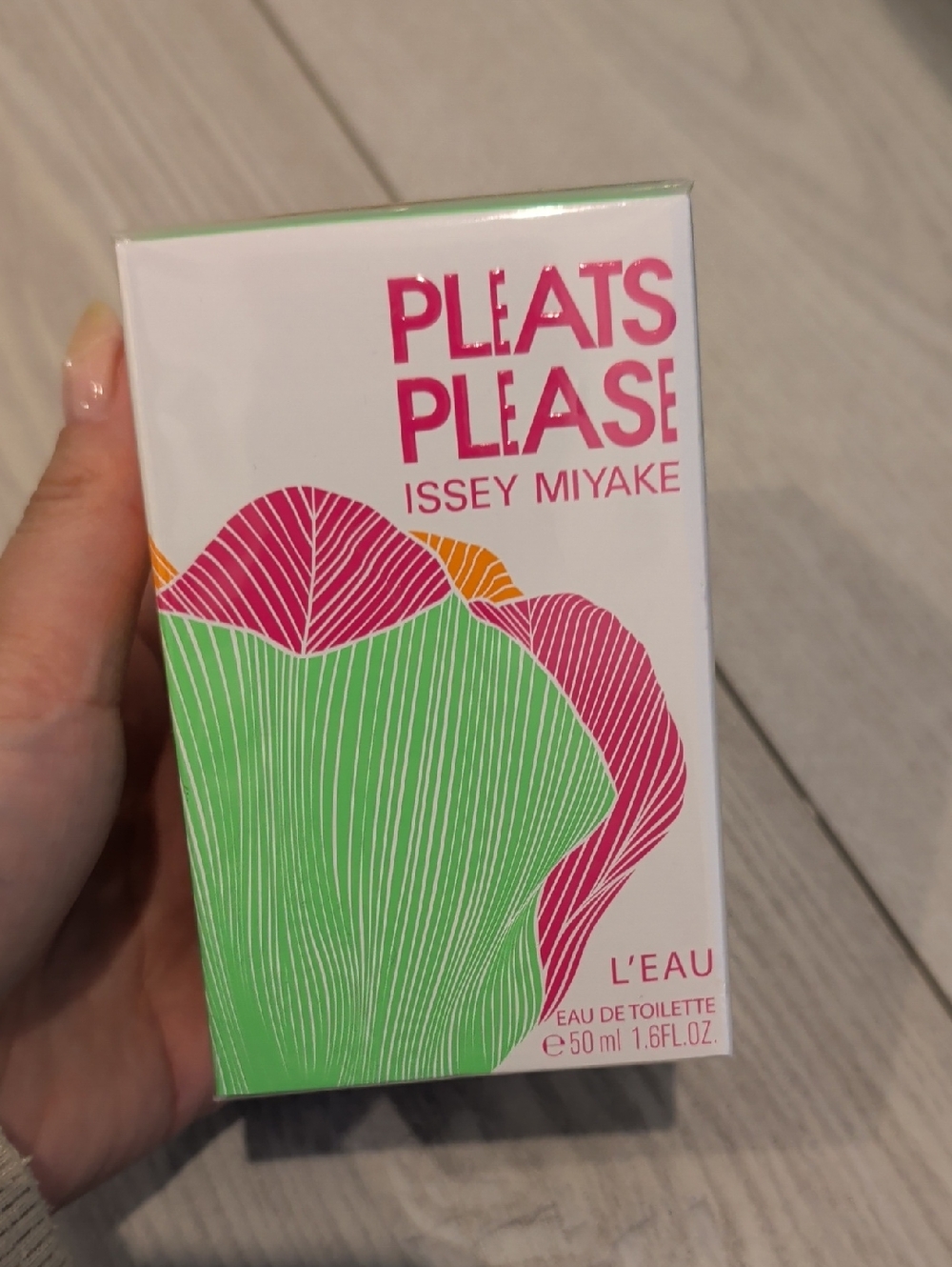 Issey Miyake White Box with Pink Text